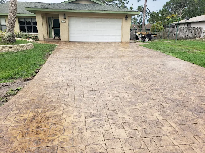 Stamped concrete driveway installation by HCS Concrete in Vero Beach, Florida